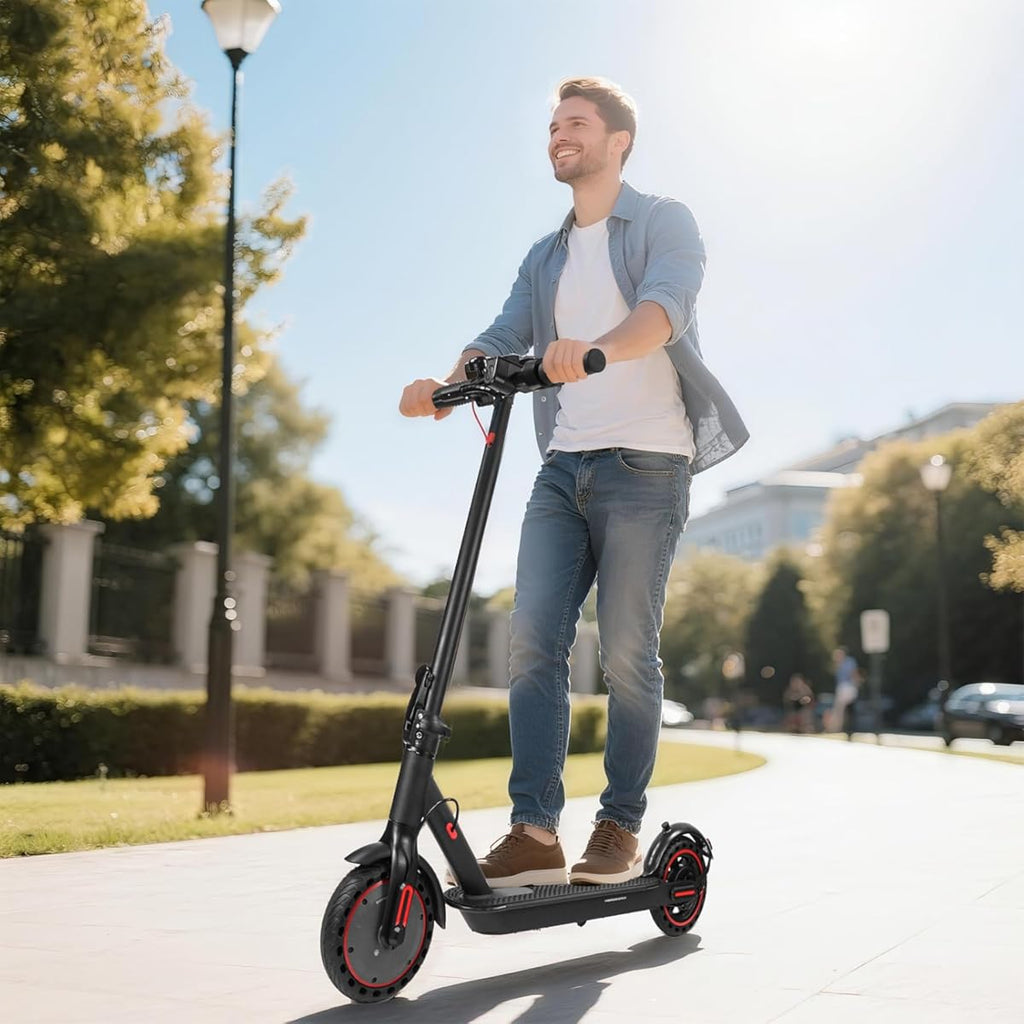 Scooter eléctrico plegable para adultos con autonomía de 29 a 45 km, 30/35 km/h, neumáticos de 21/25 cm y sistemas de doble suspensión y frenado.
